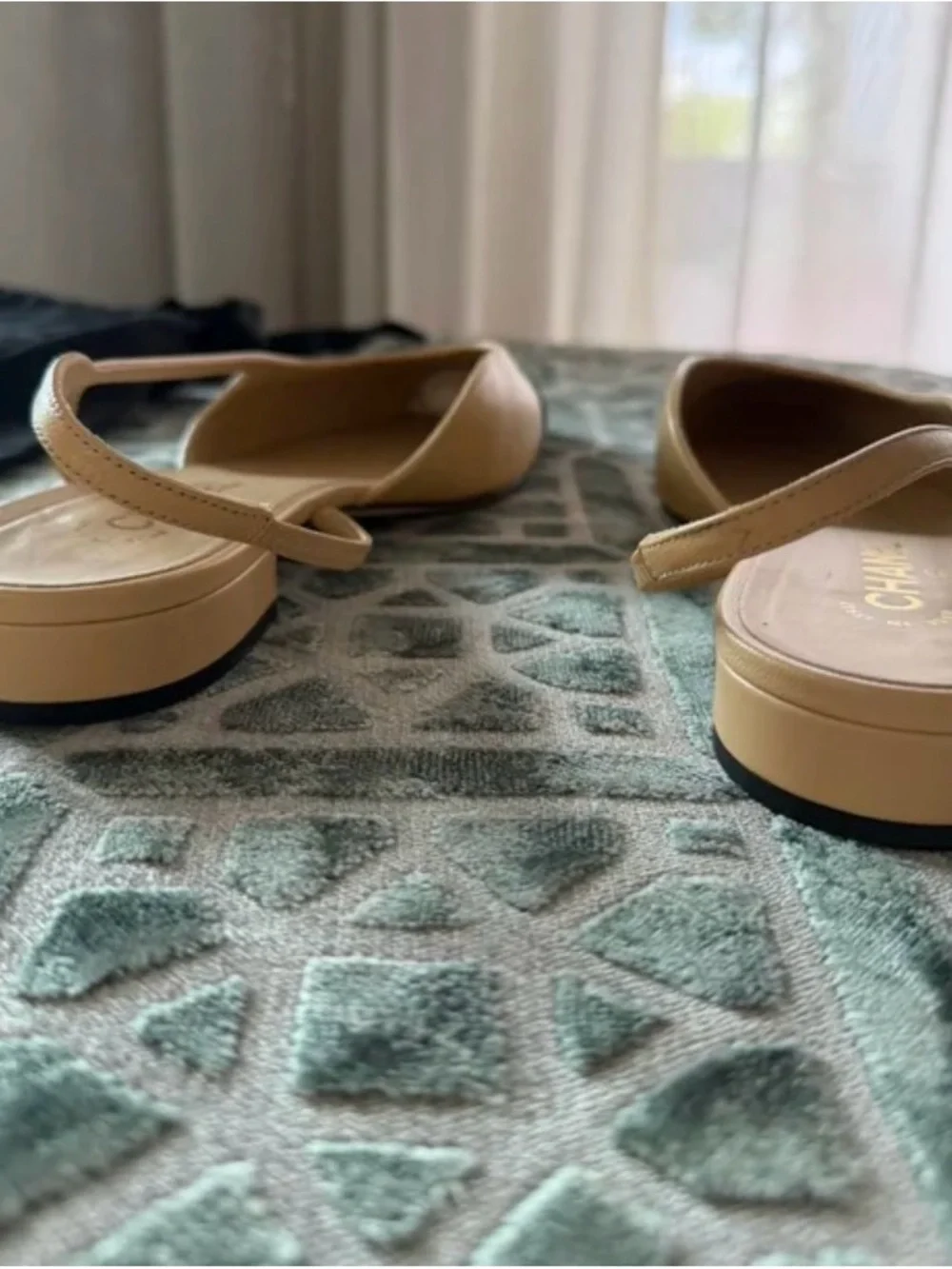 CHANEL Beige Leather Slingback Flats with Black Cap Toe